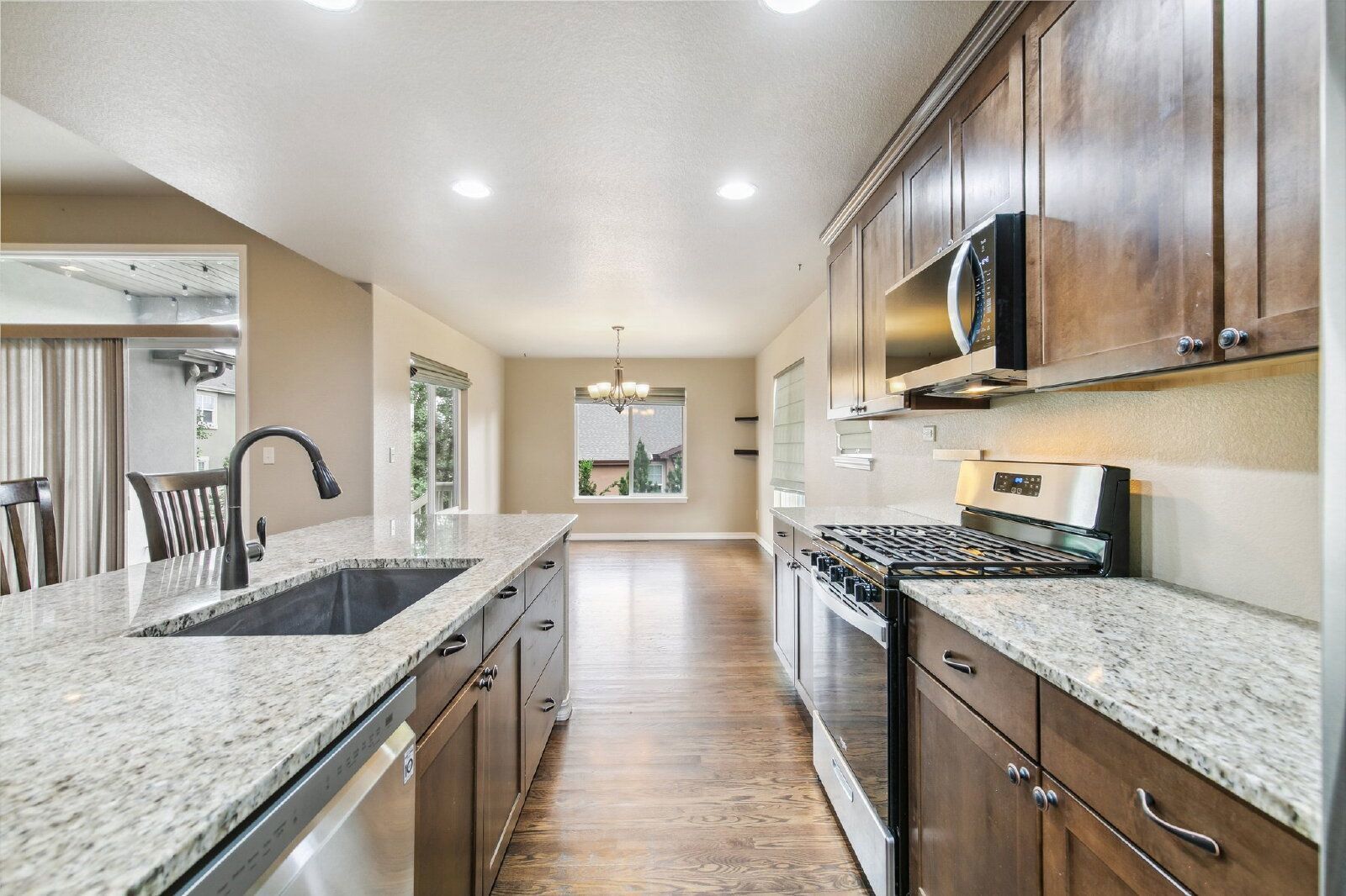 Stylish Cordera Ranch with Finished Basement, Gourmet Kitchen, and Ideal D20 Location property image