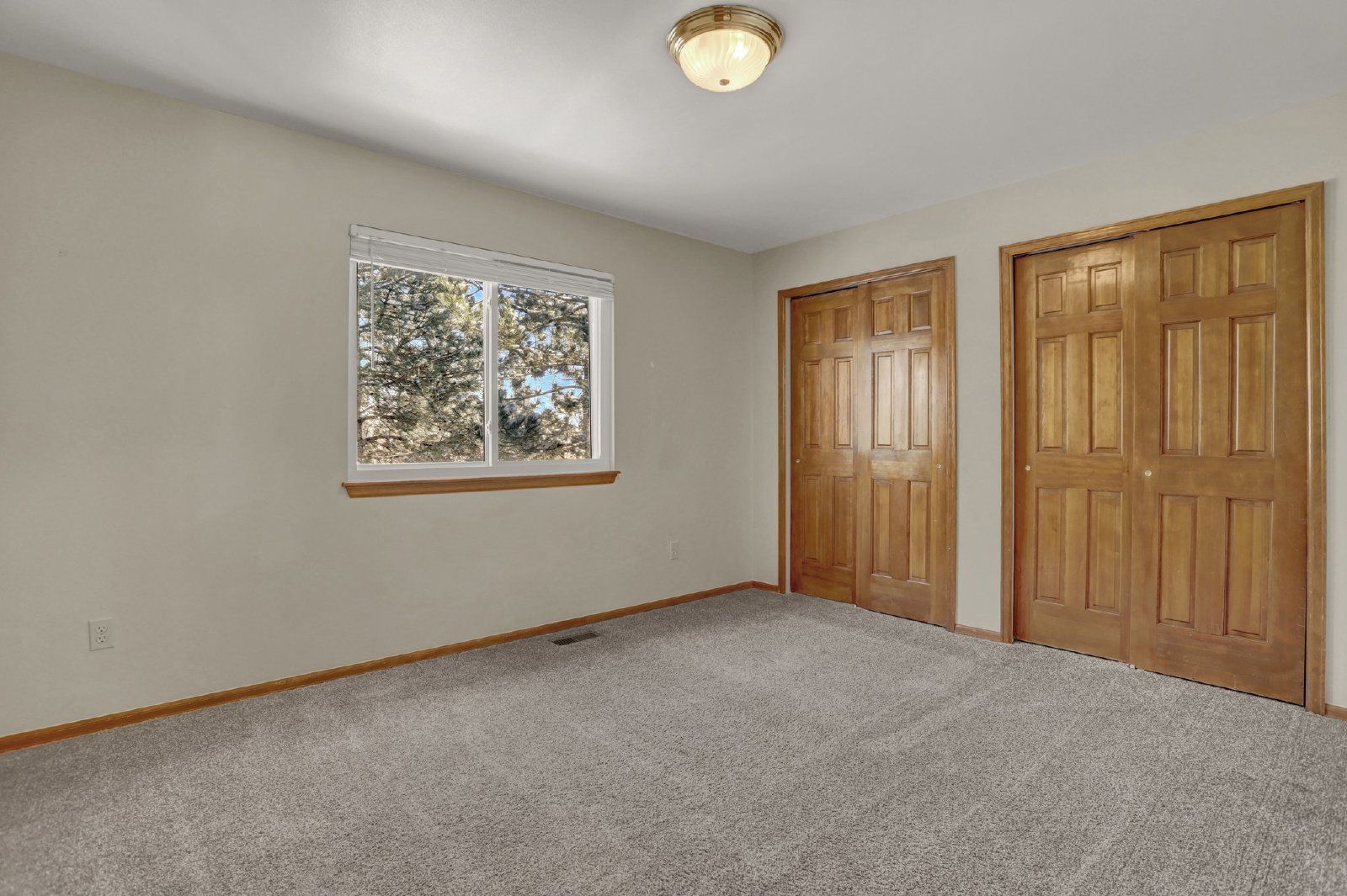 Spacious 6-Bedroom Home in Cheyenne Mountain District 12 with Finished Basement and 3-Car Garage property image