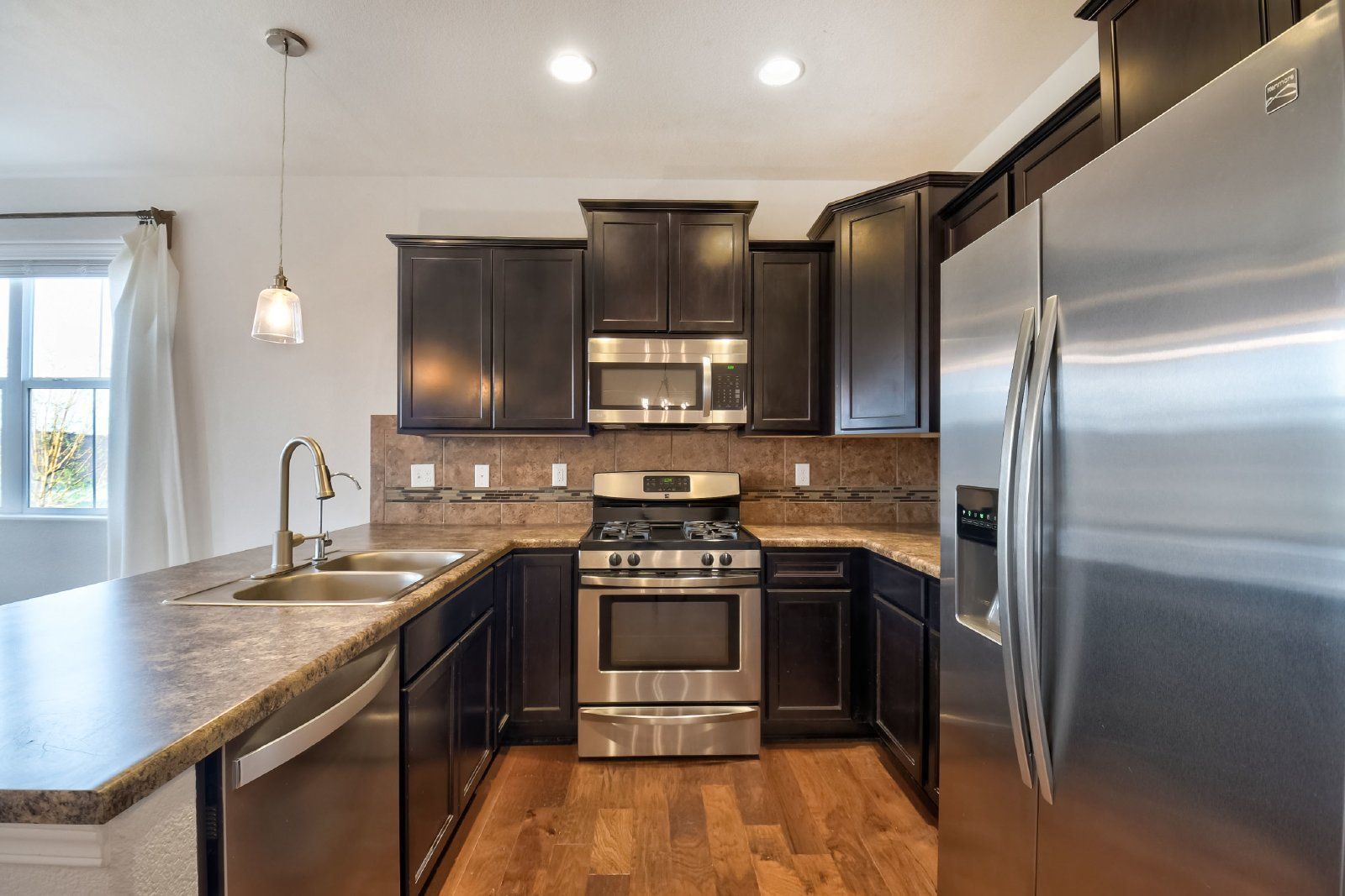 Immaculate 3-Bedroom Townhome with Stainless Steel Appliances and Attached Garage Near Peterson SFB property image