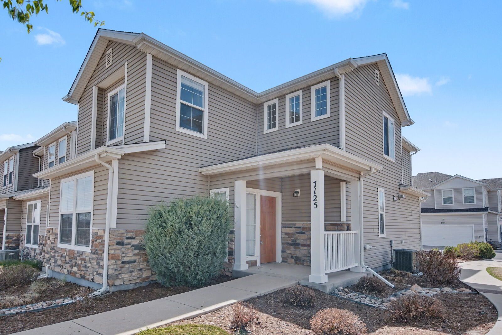 Beautifully Updated 3-Bedroom End-Unit Townhome Facing Open Space with Attached 2-Car Garage in Gated Sand Creek Villas property image