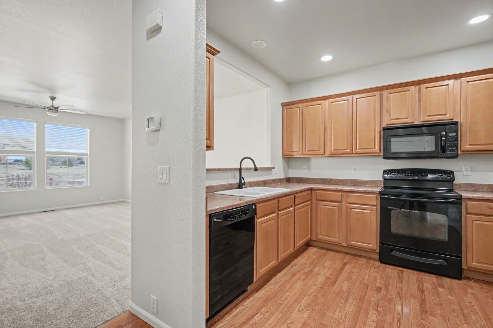 Beautifully Updated 3-Bedroom End-Unit Townhome Facing Open Space with Attached 2-Car Garage in Gated Sand Creek Villas property image