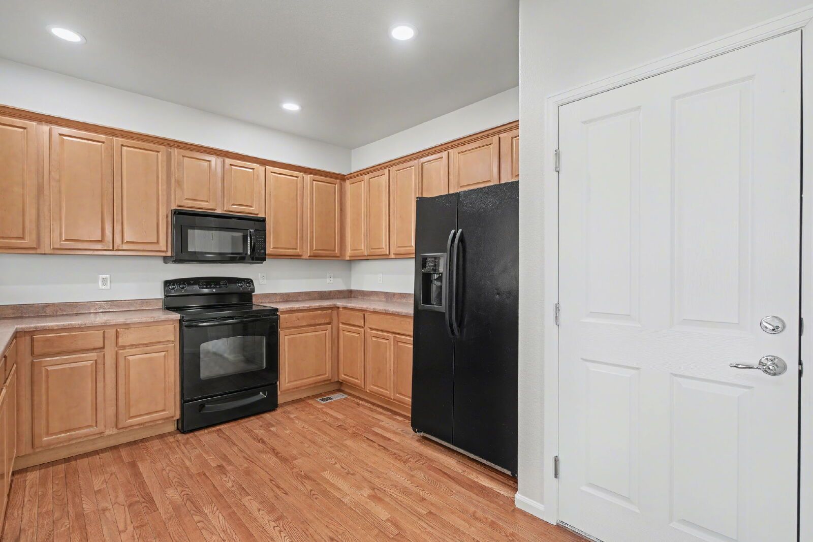 Beautifully Updated 3-Bedroom End-Unit Townhome Facing Open Space with Attached 2-Car Garage in Gated Sand Creek Villas property image