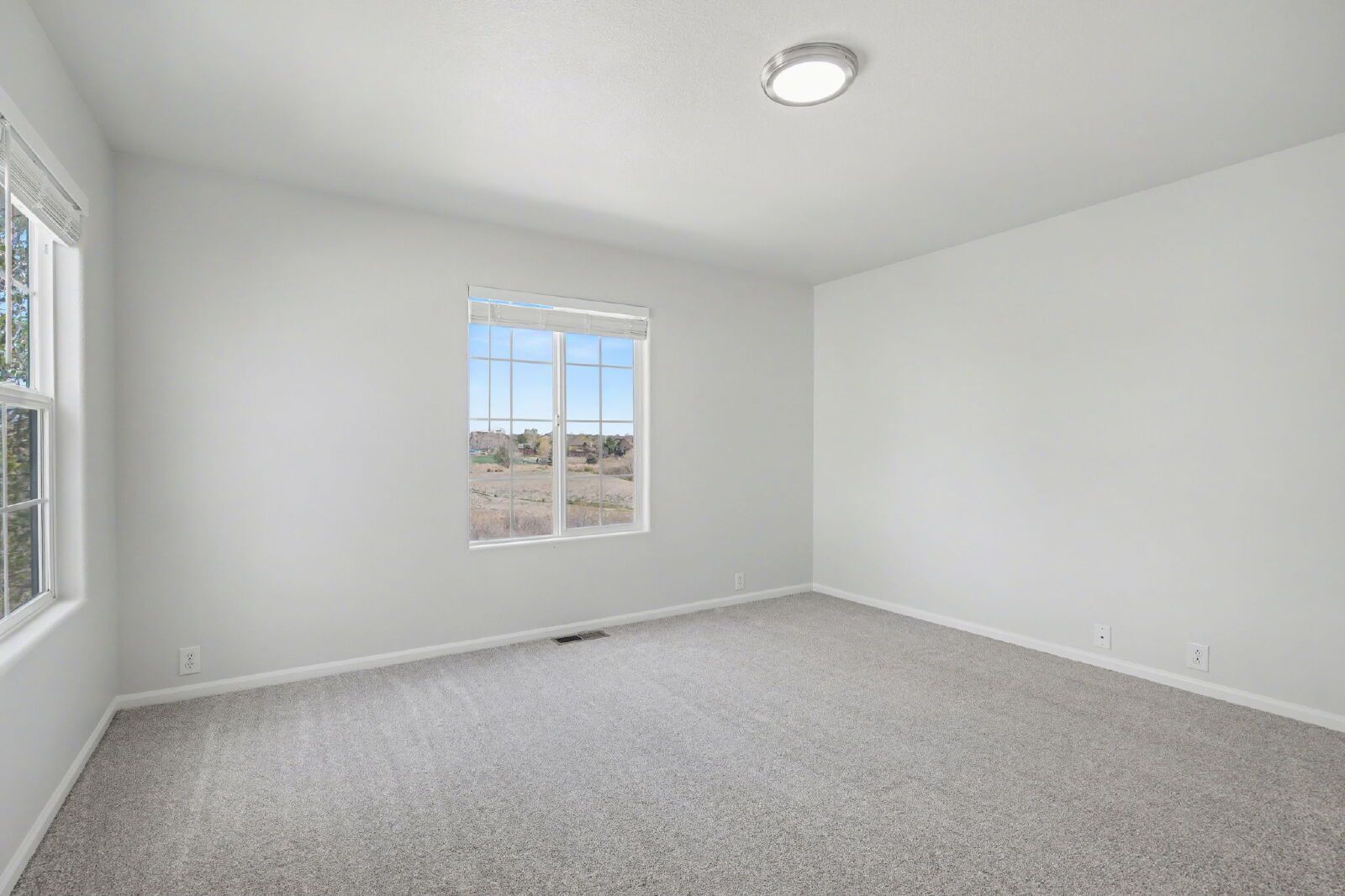 Beautifully Updated 3-Bedroom End-Unit Townhome Facing Open Space with Attached 2-Car Garage in Gated Sand Creek Villas property image