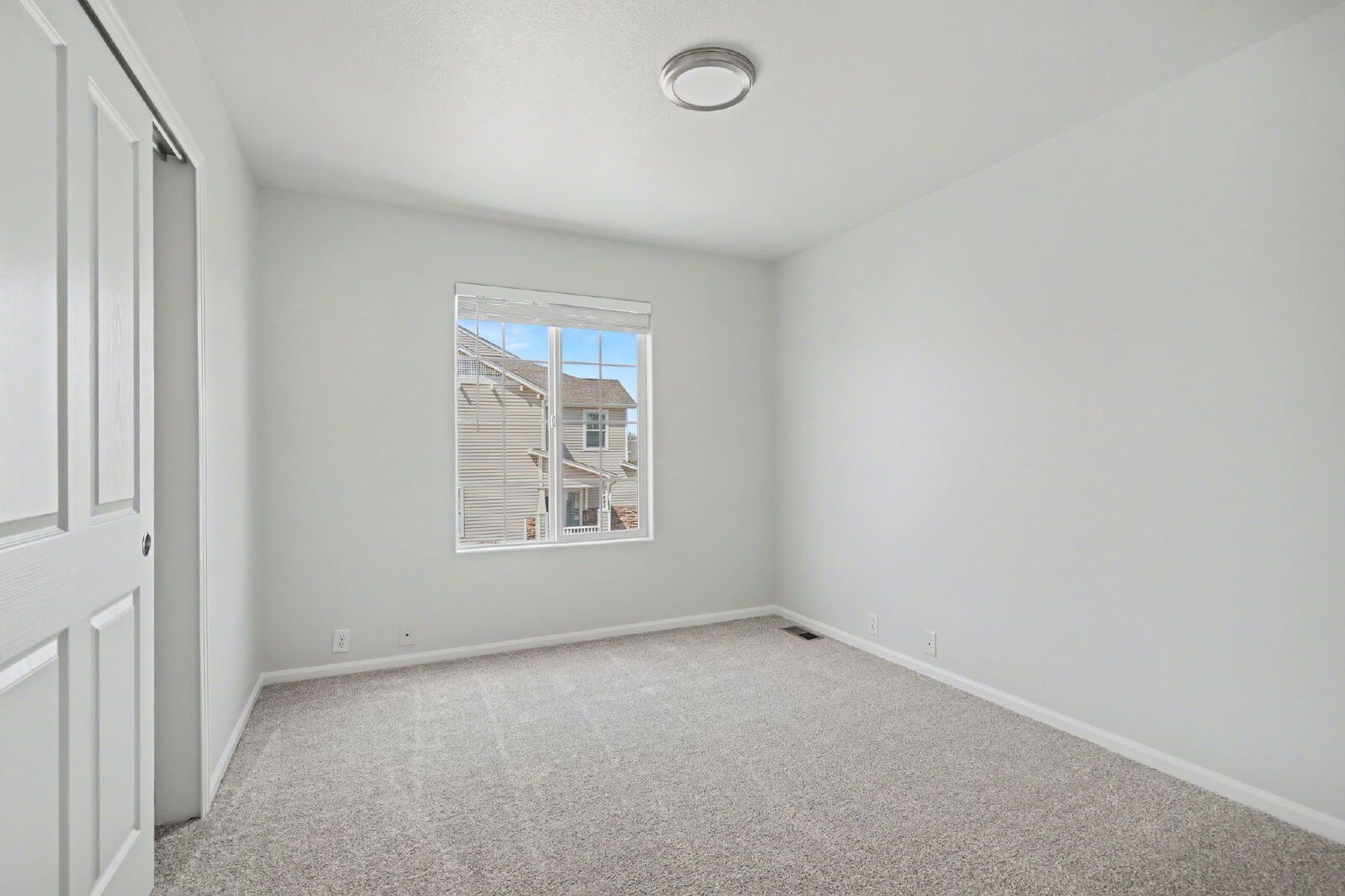 Beautifully Updated 3-Bedroom End-Unit Townhome Facing Open Space with Attached 2-Car Garage in Gated Sand Creek Villas property image