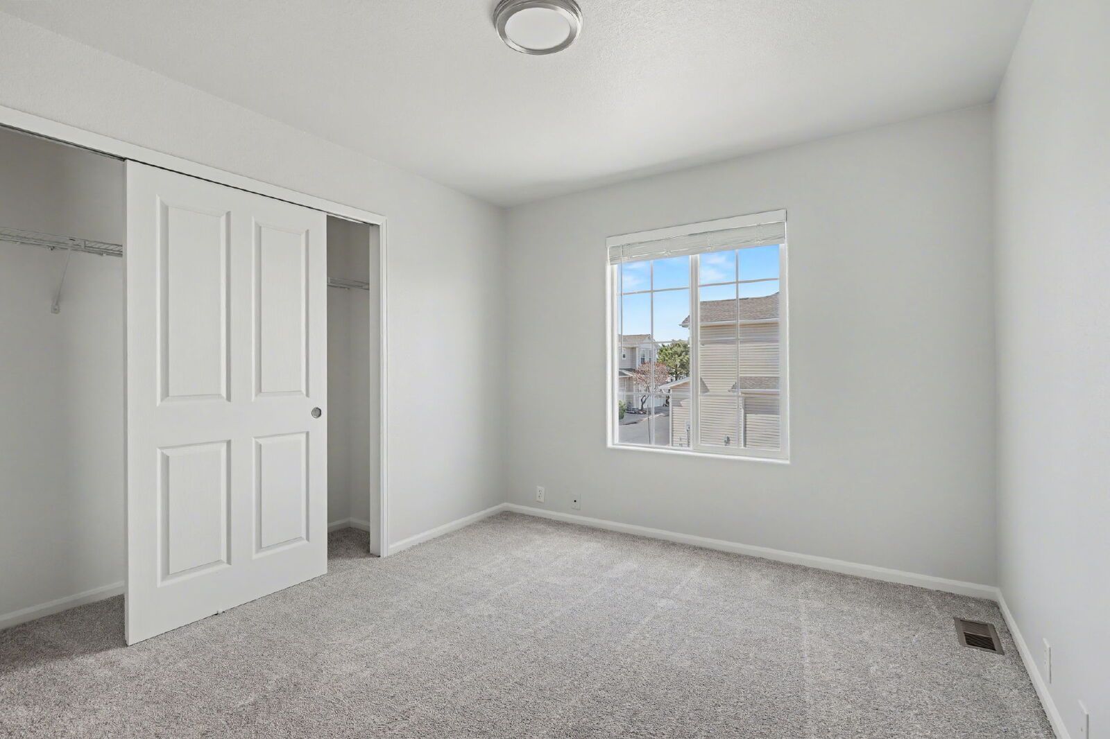 Beautifully Updated 3-Bedroom End-Unit Townhome Facing Open Space with Attached 2-Car Garage in Gated Sand Creek Villas property image